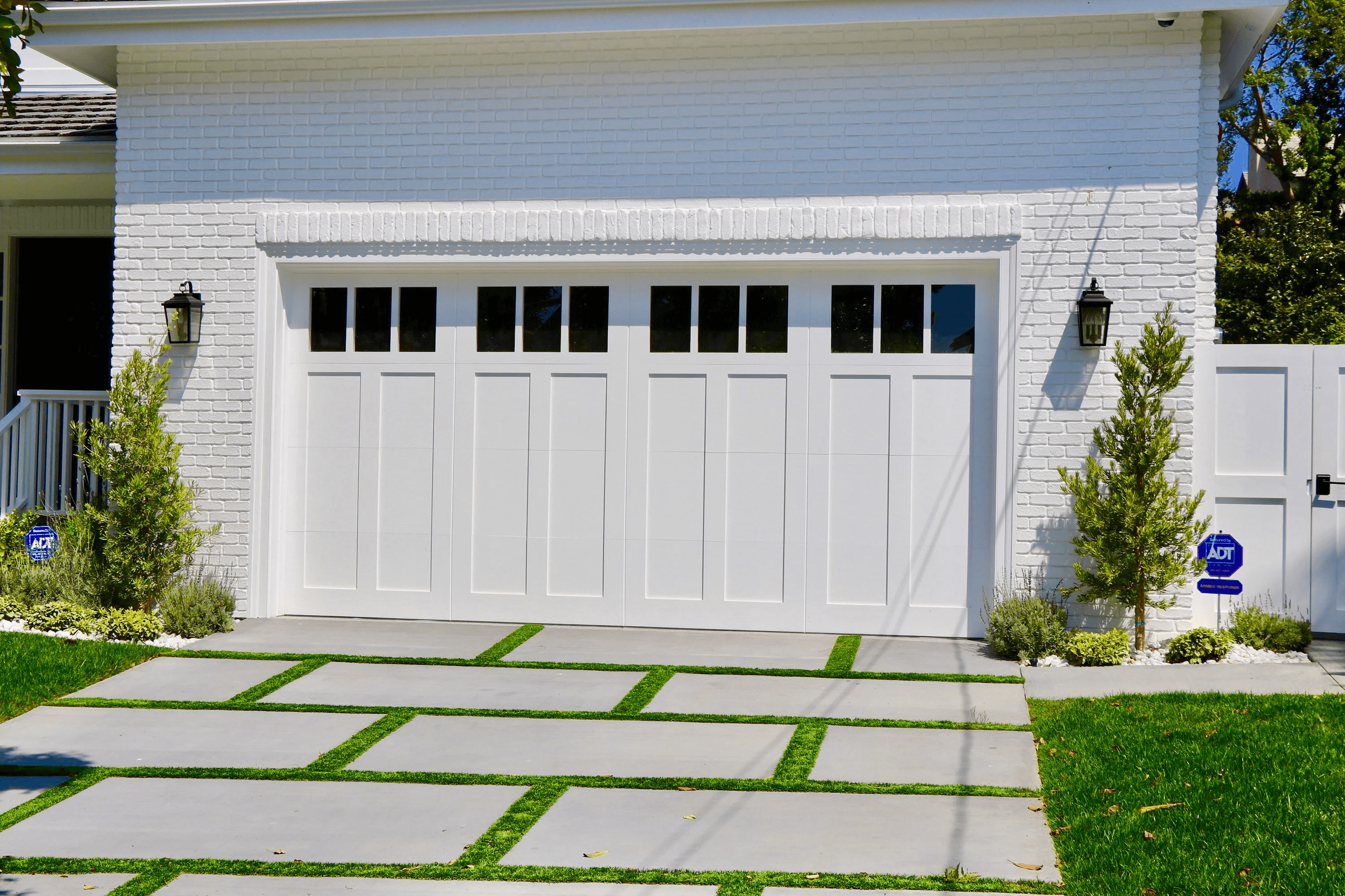 Modern brown garage door with classic panels